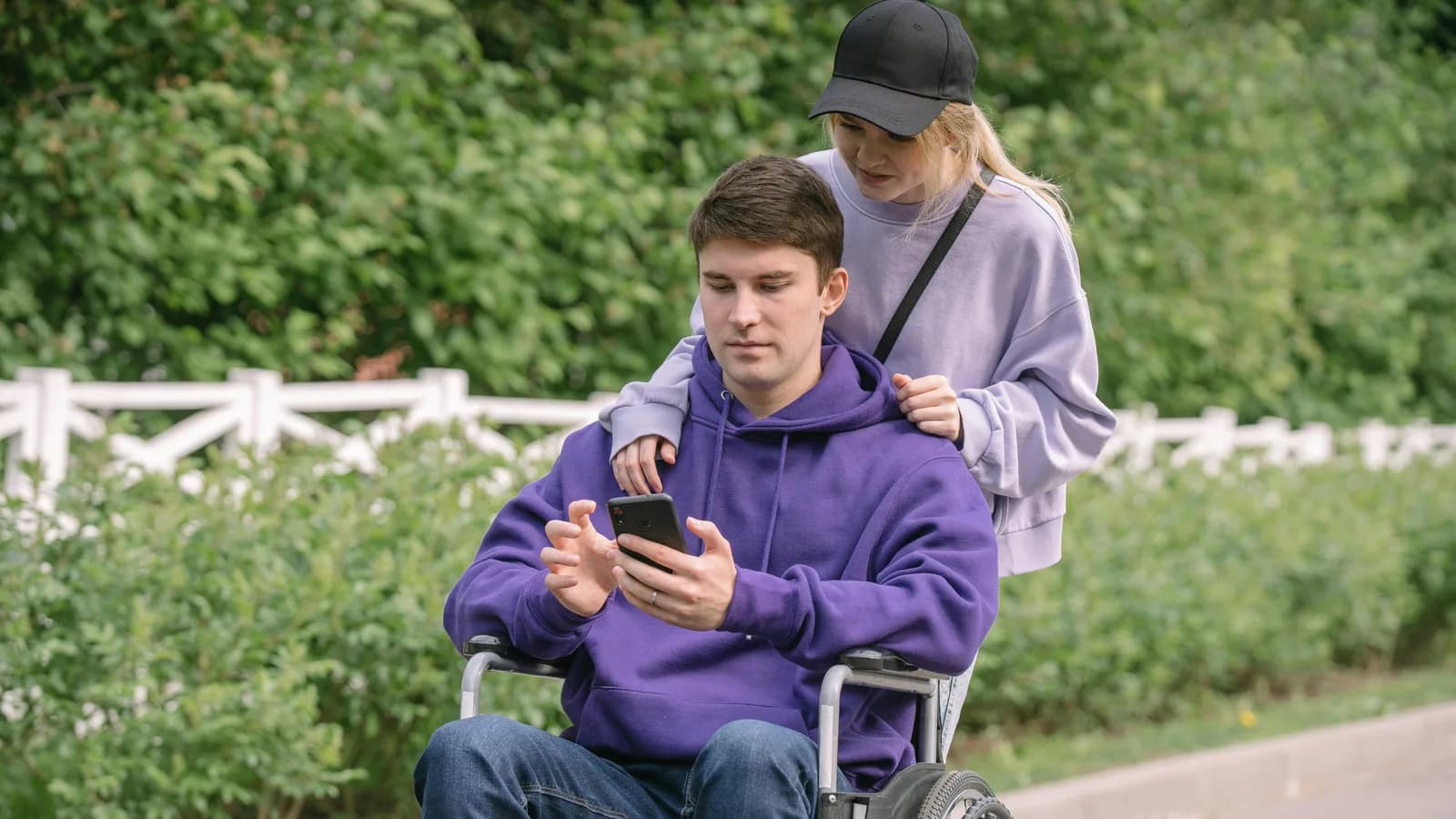 NDIS provider support worker speaking with a participant family